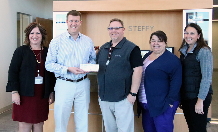 Gene Steffy's Ford makes a donation to CHS Band Boosters